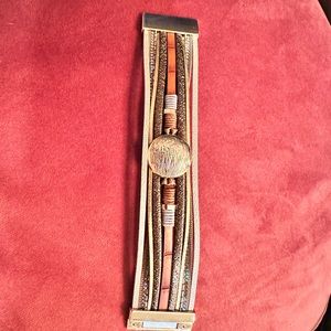 Bracelet with magnetic clasp. Like new condition. Gold earth tone jewelry